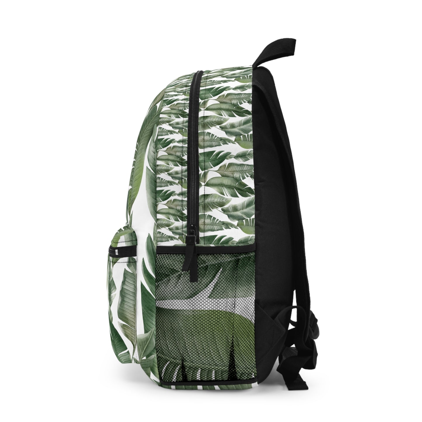 Mochila con estampado de hojas tropicales: elegante y funcional para el día a día.