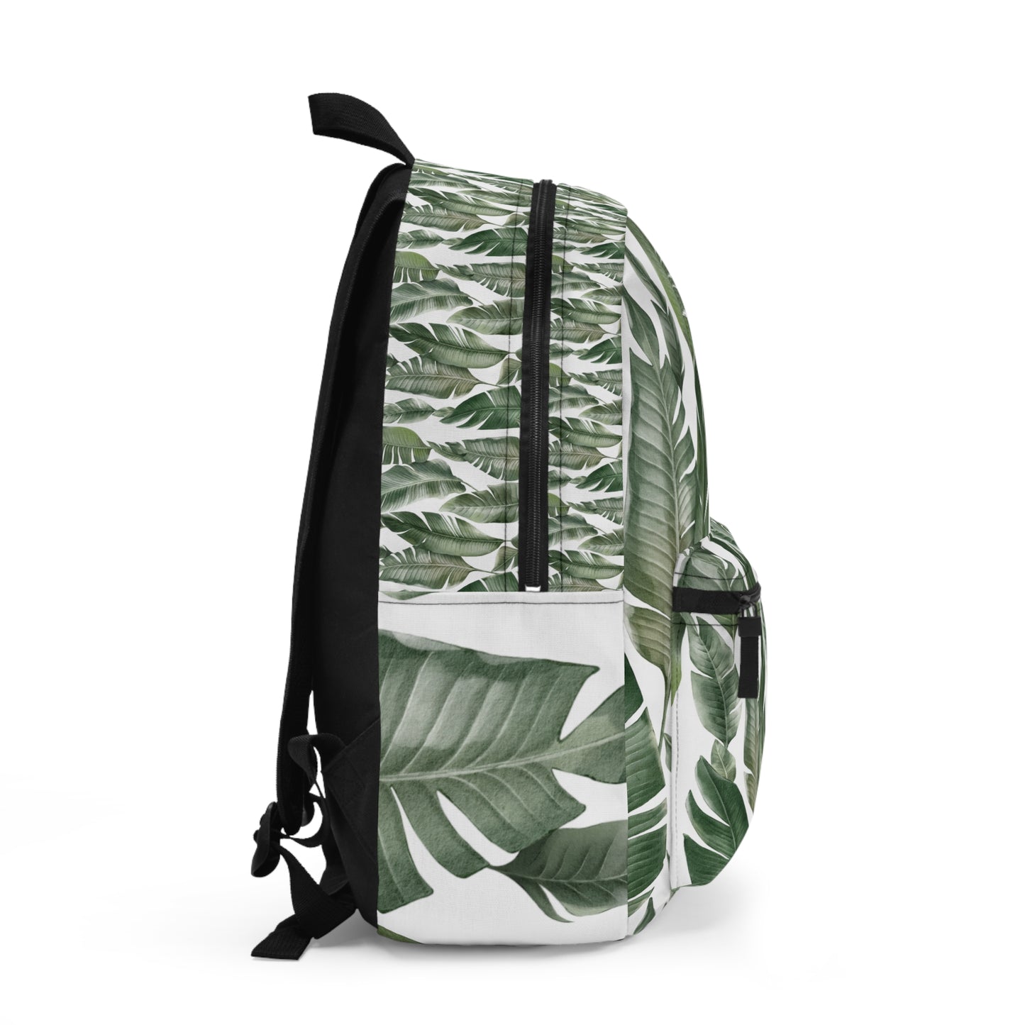Mochila con estampado de hojas tropicales: elegante y funcional para el día a día.