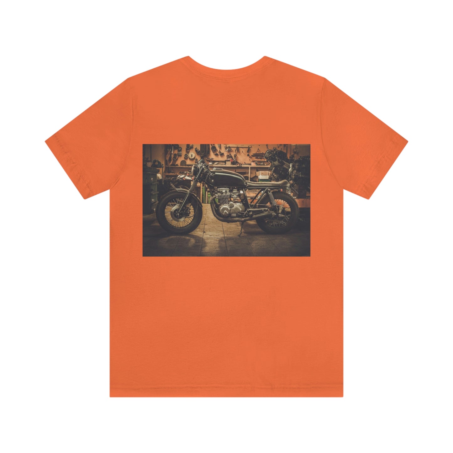 Motorcycle in Garage. Unisex Jersey Short Sleeve T-shirt. Sizes: Small through 3 Extra large. Four Colors. Price: $35.00 each. Custom Artwork. Unique Whimsical Flare. Vivid Colors. Great for Men, Women and Children. Soft against your skin. Comfortable to wear every day of the week. I love the quality and fit. Gonna go to Natchez Mississippi and visit Melrose Estate. Definitely Amazing!